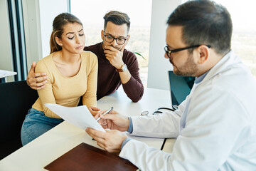 doctor woman man patient hospital care clinic couple young health female medical medicine...