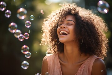 Beautiful portrait of a girl in nature with soap bubbles.