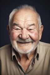 Obraz premium portrait of a happy senior man smiling at the camera