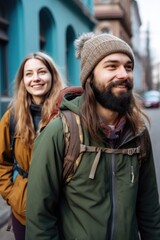 portrait of a young man and woman going for a hike in the city