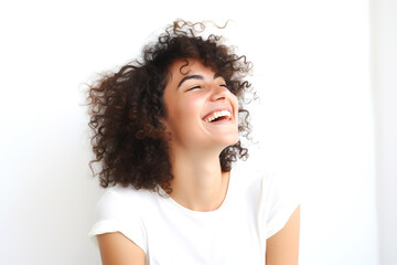 Portrait of a smiling young woman on a white background