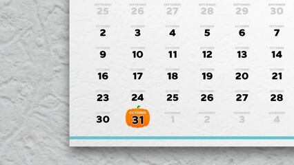 Close-up of a beautiful October page of the wall calendar 2023 and the camera moves to Halloween date marked with a pumpkin icon