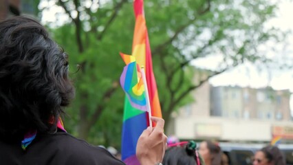 People hold Flag and people at pride parade. Chicago IL. USA 25 jun 2023 