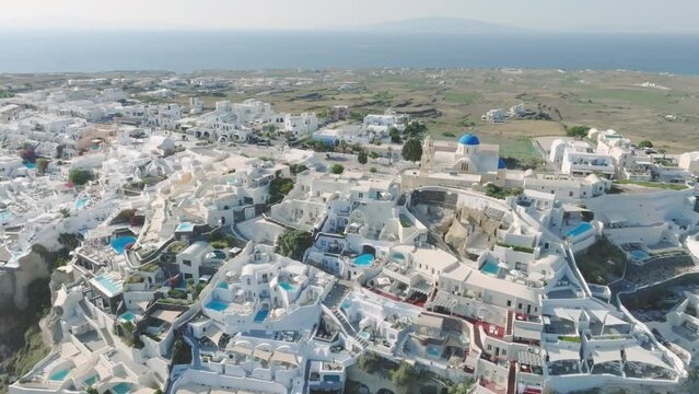 Sun-drenched beauty of Santorini, from above.