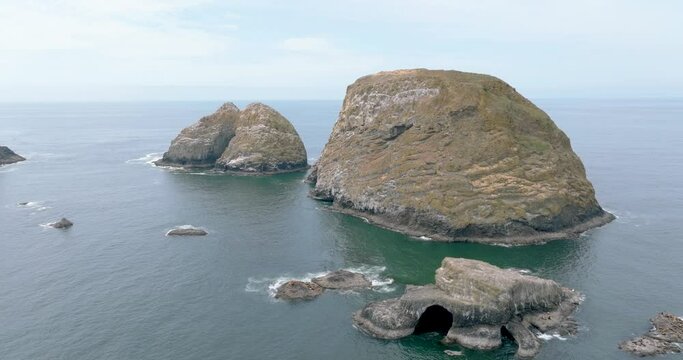 Drone's view unveils Oregon's foggy coastline.