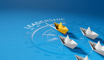 Leadership concept, yellow leader boat leading whites on compass © ruangrit19