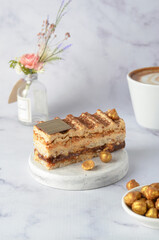 Caramel and Hazelnut Cake, Dacquoise Cake on Bright Background