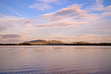 Oncoming sunset above the lake near Palava hills at South Moravia, Czech republic