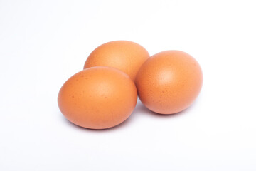 many chicken eggs isolated on a white background