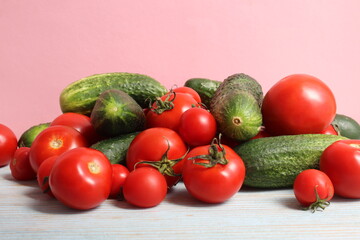 Background from fresh cucumbers and tomato.