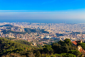 Fototapeta na wymiar View of Barcelona city from the mountain Tibidabo in Catalonia, Spain