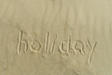 The inscription on the sand of the beach