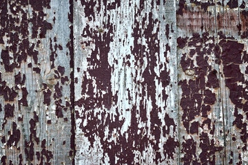 Obraz premium background, three old boards stand vertically with cracked dark paint