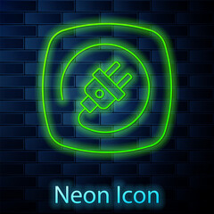 Glowing neon line Electric plug icon isolated on brick wall background. Concept of connection and disconnection of the electricity. Vector