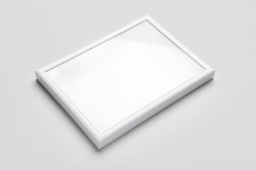 Blank picture frame on light background