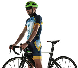 Male cyclist in uniform, helmet and goggles standing with bicycle isolated on transparent background. Professional sport. Concept of healthy lifestyle, sport, action, motion, hobby, health
