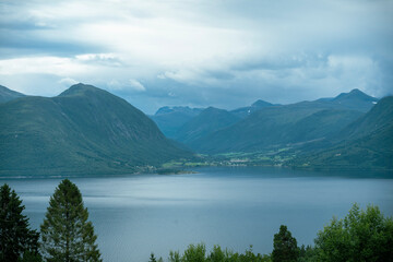 Fototapeta na wymiar Beautiful view at the fjord and mountains in Norway. Landscape, scenic.