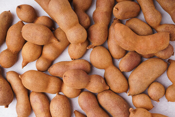 Tasty tamarinds on white background