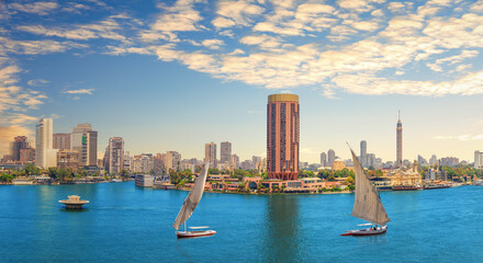 View on the sailboats in the Nile, TV tower and the river bank, Cairo, Egypt