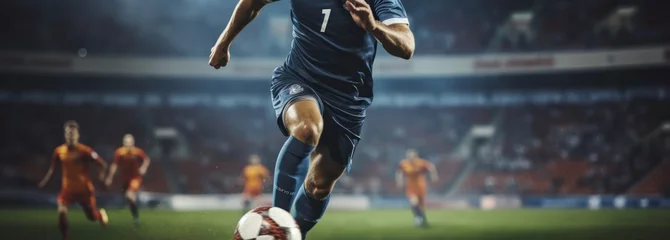 Tuinposter Soccer player in action on the field of stadium. Blurred background. Football Concept With a Copy Space. Soccer Concept With a Space For a Text. © John Martin