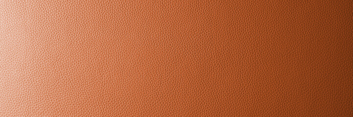 Fototapeta premium Abstract background, wide banner with orange gradient leather texture. Genuine structure, luxury pattern. Gradient, wallpaper, panoramic, wide, web banner, design element, backdrop.