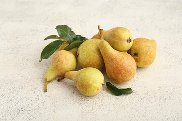 Heap of ripe pears on white background