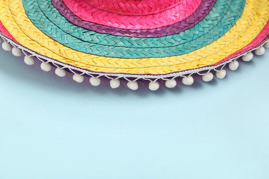 Sombrero hat for Mexico's Independence Day on blue background, closeup