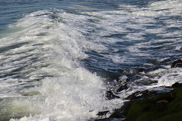 waves crashing on the rocks
