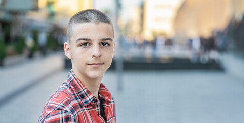 portrait of a young man on a city street