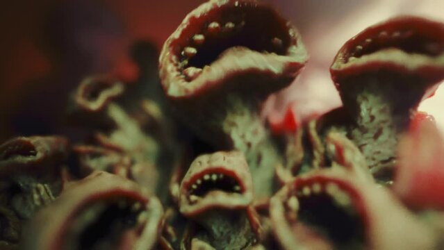 Creepy surreal gnawing, biting hungry creatures. Alien lifeform. Hunger concept. Chanting crowd. Extraterrestrial life. Horror sci-fi video. Dangerous exotic animals. Hungry mouths. Science-fiction.