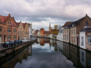 Naklejka na ściany i meble Idyllic canal reflections in medieval city of Bruges, Belgium
