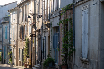 View on old streets and houses in ancient french town Arles, touristic destination with Roman ruines, Bouches-du-Rhone, France