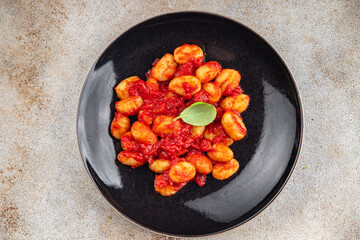 gnocchi delicious potato dish tomato sauce no meat ready meal appetizer meal food snack on the table copy space food background rustic top view vegetarian vegan food  