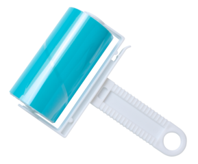 Roller with sticky tape for cleaning clothes on a white background, top view