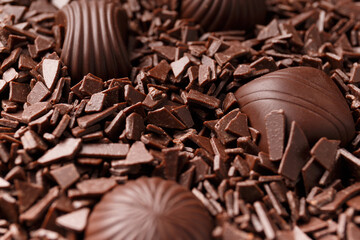 Candies in chocolate chips close-up macro photography.