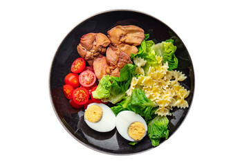 salad chicken liver, pasta, tomato, green leaf lettuce, boiled egg, farfalle snack meal food on the table copy space food background rustic top view