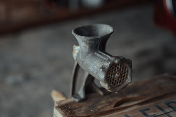 Old, slightly rusty meat grinder