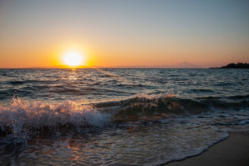 Beautiful nature with sunrise on the beach and sea or ocean.  Nature composition.