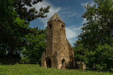 Fototapeta na wymiar Ancient basalt tower of Avas church ruin at Szigliget near Lake Balaton, Hungary