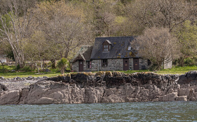 Old stone croft house on the edge of a Loch © Colleenashley
