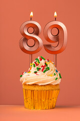 Candle number 89 - Cake birthday in coral fusion background