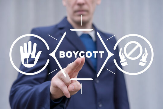 Man using virtual touch interface presses word: BOYCOTT. Concept of boycott. Person protest or group demonstration.