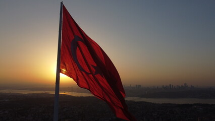A drone shot of the Camlica Flagpole, Istanbul at sunset.