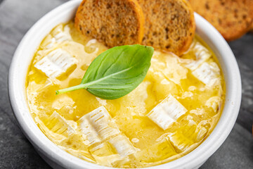 camembert baked cheese brie or tartiflette soft cheese meal food snack on the table copy space food...