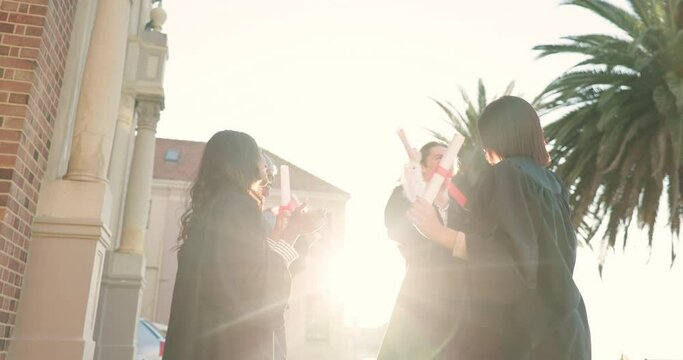 Happy people, applause and high five in graduation celebration for diploma, degree or certificate together at campus. Group of graduate students in success for team achievement, milestone or winning