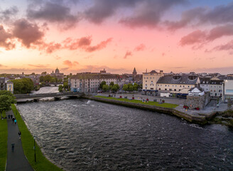 Fototapeta premium Aerial sunset panorama of Galway, harbor city on Ireland’s west coast River Corrib, Spanish Arch, Wolfe Tone Bridge and Latin Quarter