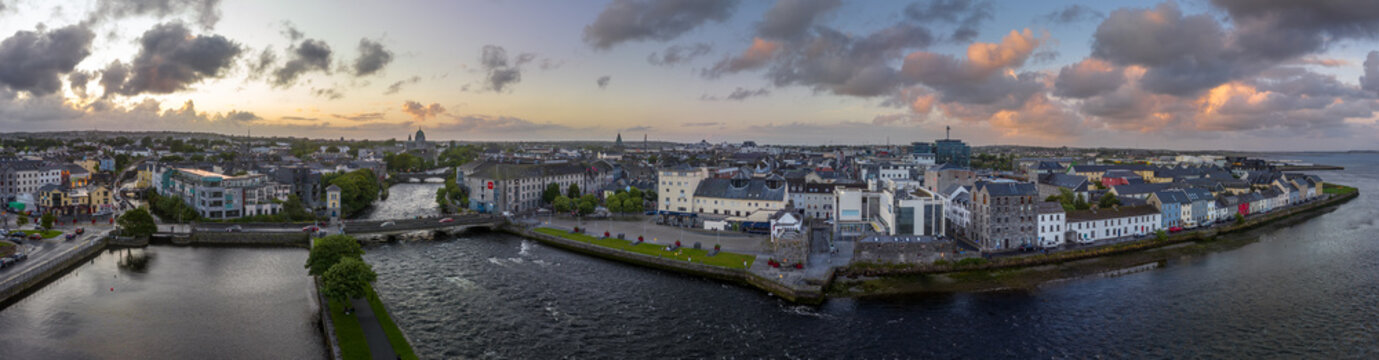Aerial sunset panorama of Galway, harbor city on Ireland’s west coast 
River Corrib, Spanish Arch, Wolfe Tone Bridge and Latin Quarter