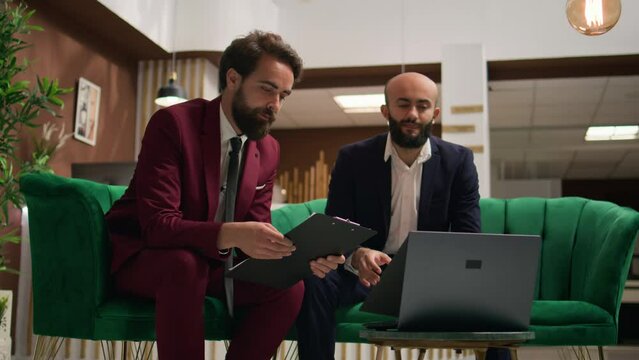 People attend videocall meeting for briefing session before participating at global shareholders event. Management team talk on remote telework call undertaking business conferences.