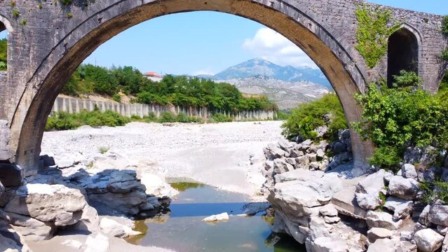 Flying inside the Old Mes Ottoman Bridge near Shkoder. Albania, Europe. Ura e Kadiut