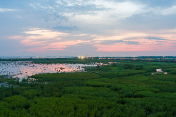 Fototapeta premium Humid August sunset on Mobile Bay
